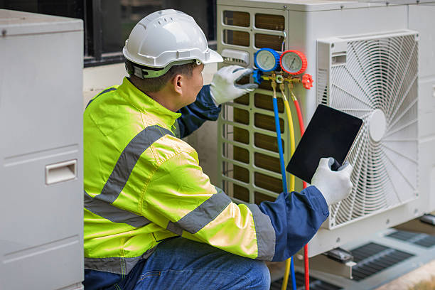 Professional Hvac technician working in Marion, MS